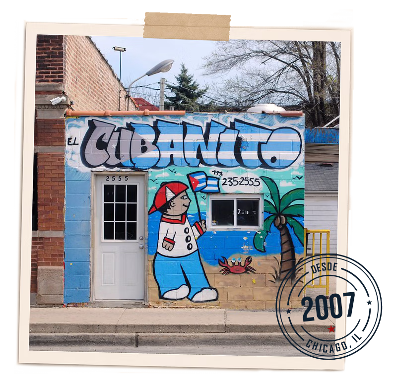 Original El Cubanito storefront with Cuban mural on Pulaski Road in Chicago